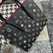 Christian Louboutin Black Leather Handbag With Gold - Tone Embellishments And Red Accents #A52420 Christian Louboutin Black Leather Handbag With Gold - Tone Embellishments And Red Accents #A52420