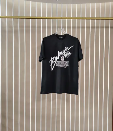 Balmain Paris Black/White T Shirt Featuring Stranger Things Logo and Bold Collaborative Graphic Design for Streetwear Fans #A54259 Balmain Paris Black/White T Shirt Featuring Stranger Things Logo and Bold Collaborative Graphic Design for Streetwear Fans #A54259