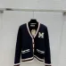 Dark Blue Miu Miu Women's V-Neck Cardigan  Embroidered "M" Logo  Textured Knit Design for Feminine Luxury  #A57759